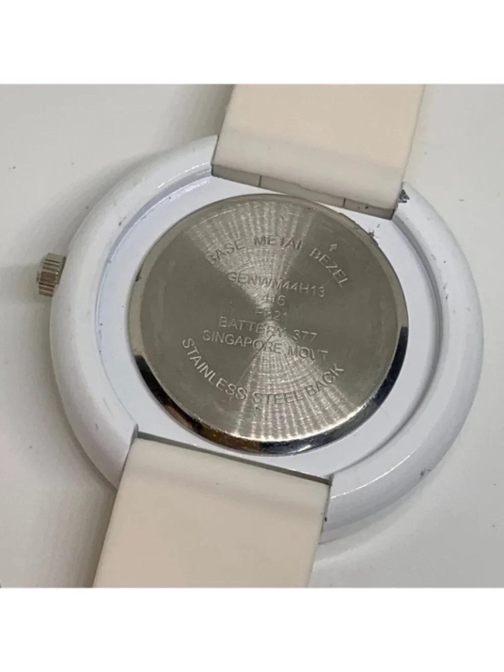 Geneva women’s watch white tone rhinestones 45mm silicone band running